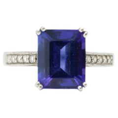 Bague en or blanc 14 carats avec tanzanite de 5,0 carats et diamants