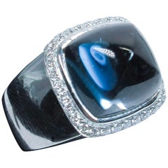 Vintage Fred of Paris 18 Karat White Gold Sugarloaf Cabochon Blue Topaz Diamond Ring