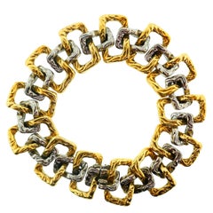 Bracelet géométrique en or jaune et blanc français Mauboussin