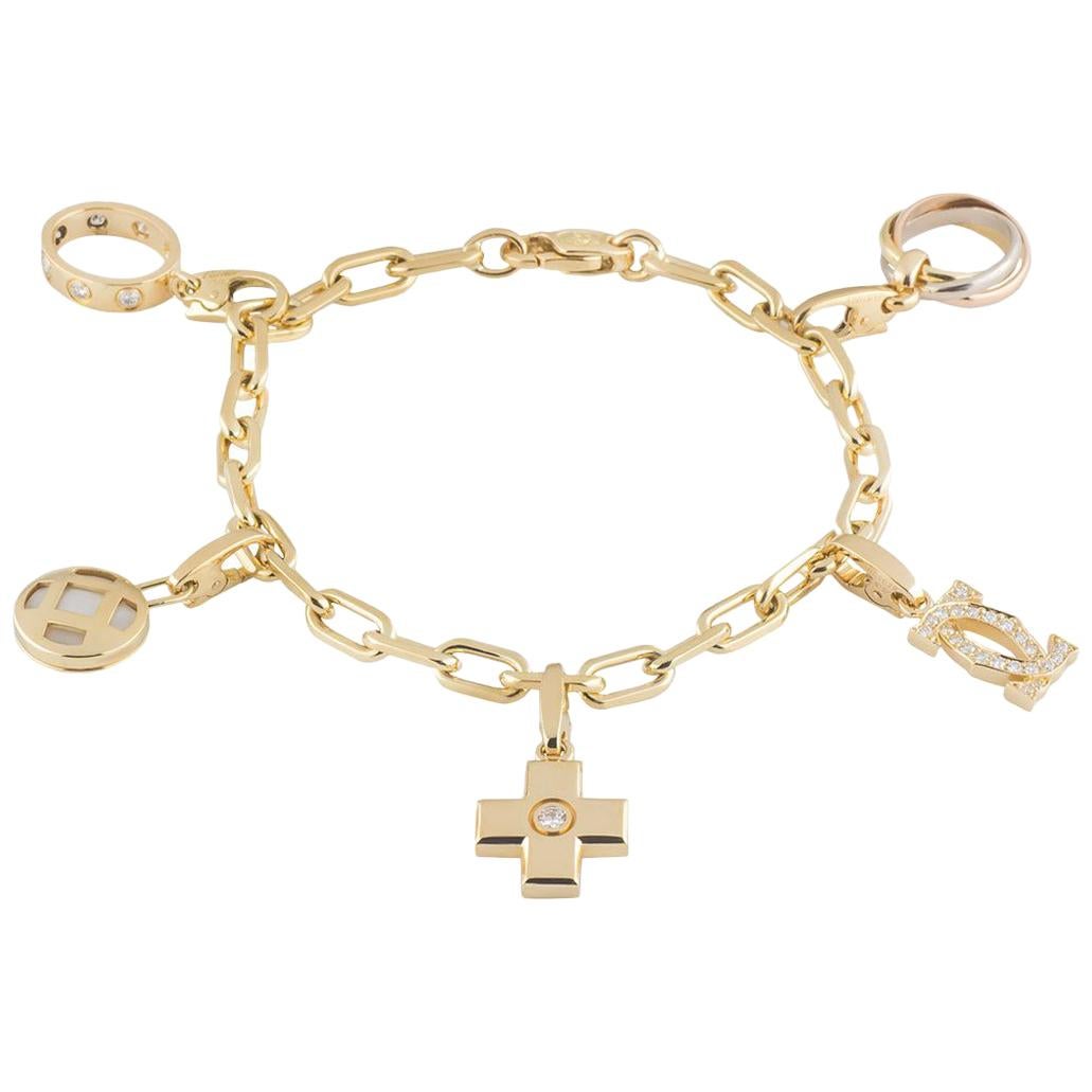 Cartier Gold Charm Bracelet with 5 Cartier Gold and Diamond Charms at ...