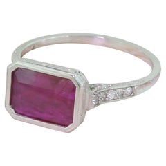 Art Deco 1.75 Carat Emerald Cut Burmese Ruby and Diamond Platinum Ring