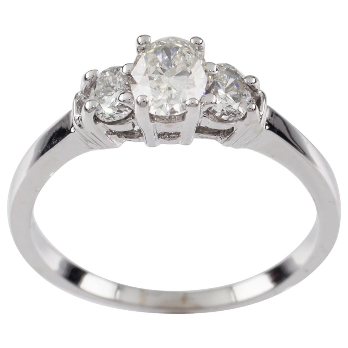 0.80 Carat Oval Cut Diamond Three-Stone 14 Karat White Gold Engagement Ring