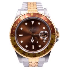 Vintage Rolex 18 Karat Gold and Stainless Steel GMT Master II “Root Beer” Watch Ref. 1