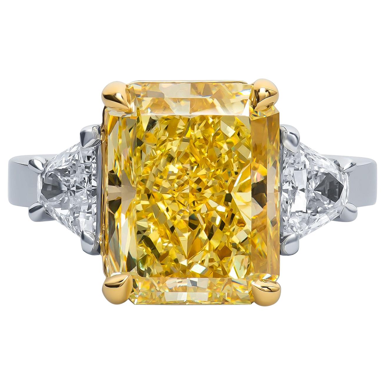 7.32 Carat ‘GIA’ Radiant Fancy Yellow Diamond with Side Trapezoid Diamonds Ring