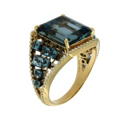 AENEA Flow Aquamarine 18k Yellow Gold Blue Topaz Ring