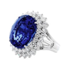 AGL Certified 26.14 Carat Oval Non Heated Blue Ceylon Sapphire and Diamond Ring