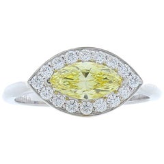 GIA Certified 0.69 Carat Marquise Fancy Intense Yellow Diamond Cocktail Ring
