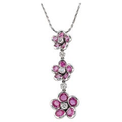 0.63 Carat Diamonds 5.68 Carat Pink Sapphire 14 Karat White Gold Flower Necklace