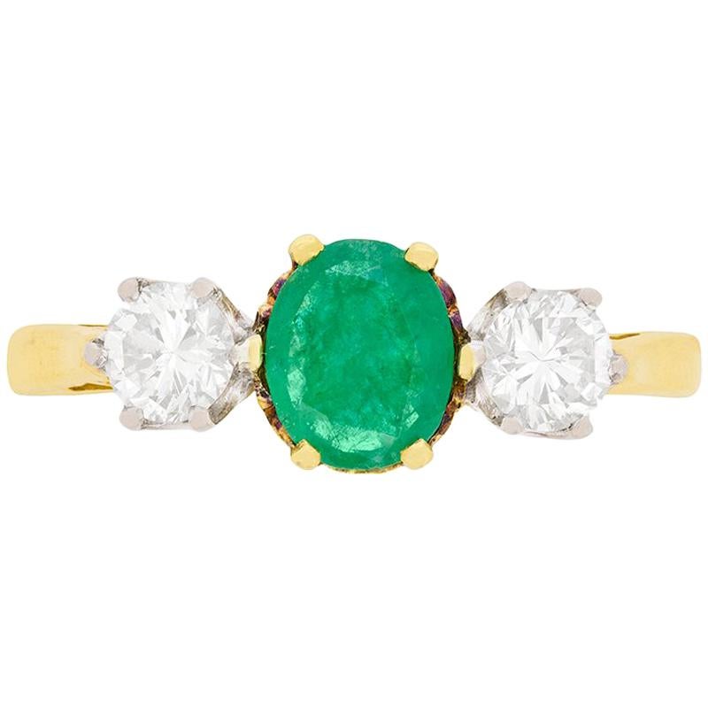 Vintage Oval Emerald and Diamond Three-Stone Ring, circa 1970s