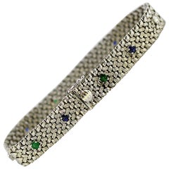 18 Karat Gold Bracelet with Diamonds, Blue Sapphires and Emeralds., France, 1950