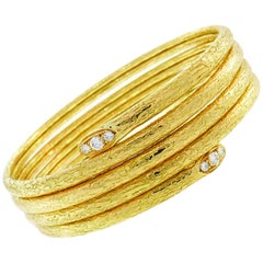 Van Cleef & Arpels Diamond Gold Bangle Bracelet Stylized Snake Spiral