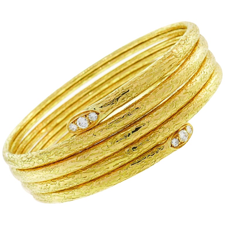Van Cleef and Arpels Diamond Gold Bangle Bracelet Stylized Snake Spiral at  1stDibs | spiral gold bracelet