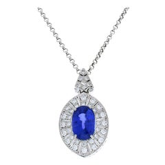 AGL Certified 12.62 Carat Oval Blue Sapphire and Diamond Pendant in Platinum