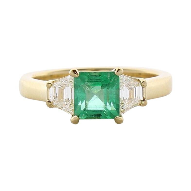 1.37 Carat Emerald Cut Emerald and Diamond Cocktail Ring in 18 Karat Yellow Gold