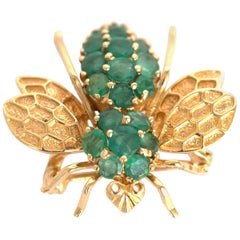 Vintage 1.25 Carat Total Weight Emerald Yellow Gold Brooch