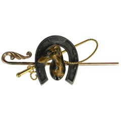 Broche épingle à chapeau art déco en fer à cheval de course avec œil de lévrier, chien et œil de tigre en or et argent