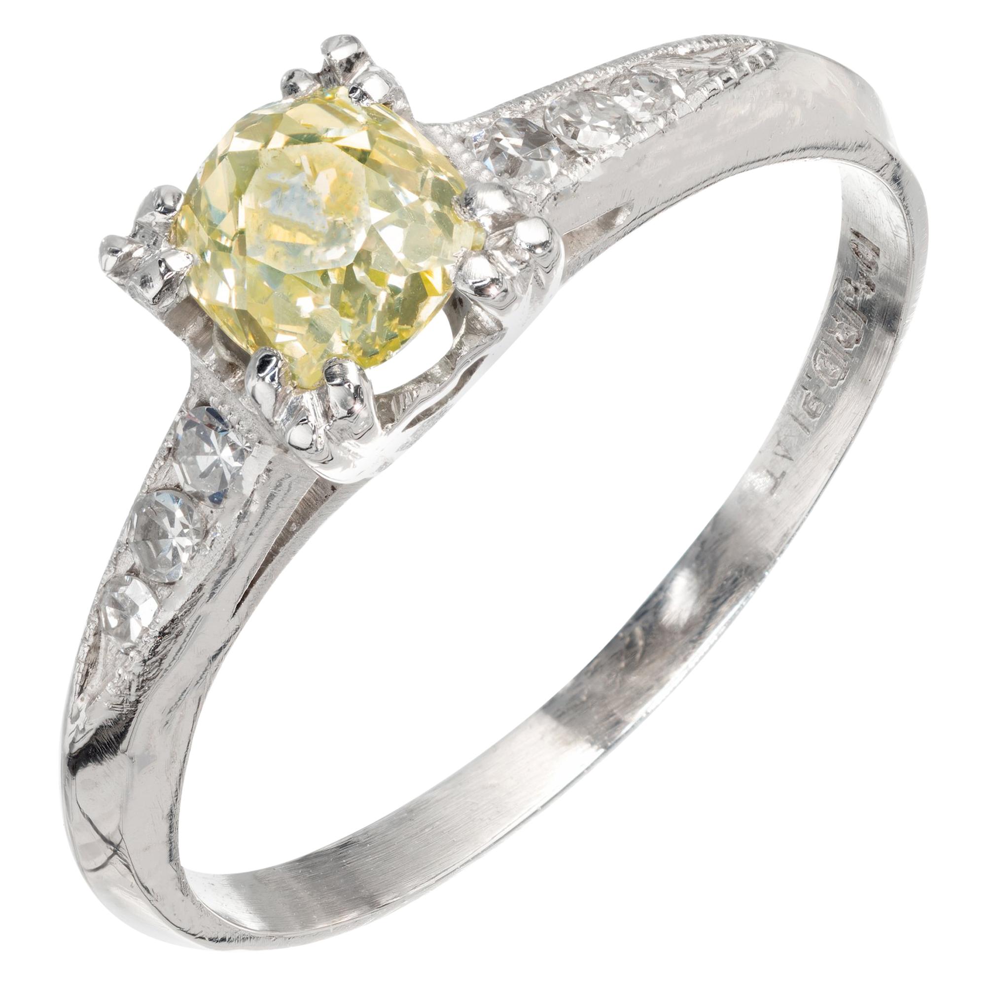 GIA Certified .58 Carat Yellow Diamond Platinum Engagement Ring
