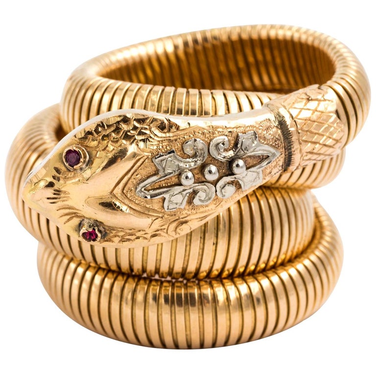 18 Karat Gold Coiled Snake Bracelet with Ruby Eyes at 1stDibs snake
