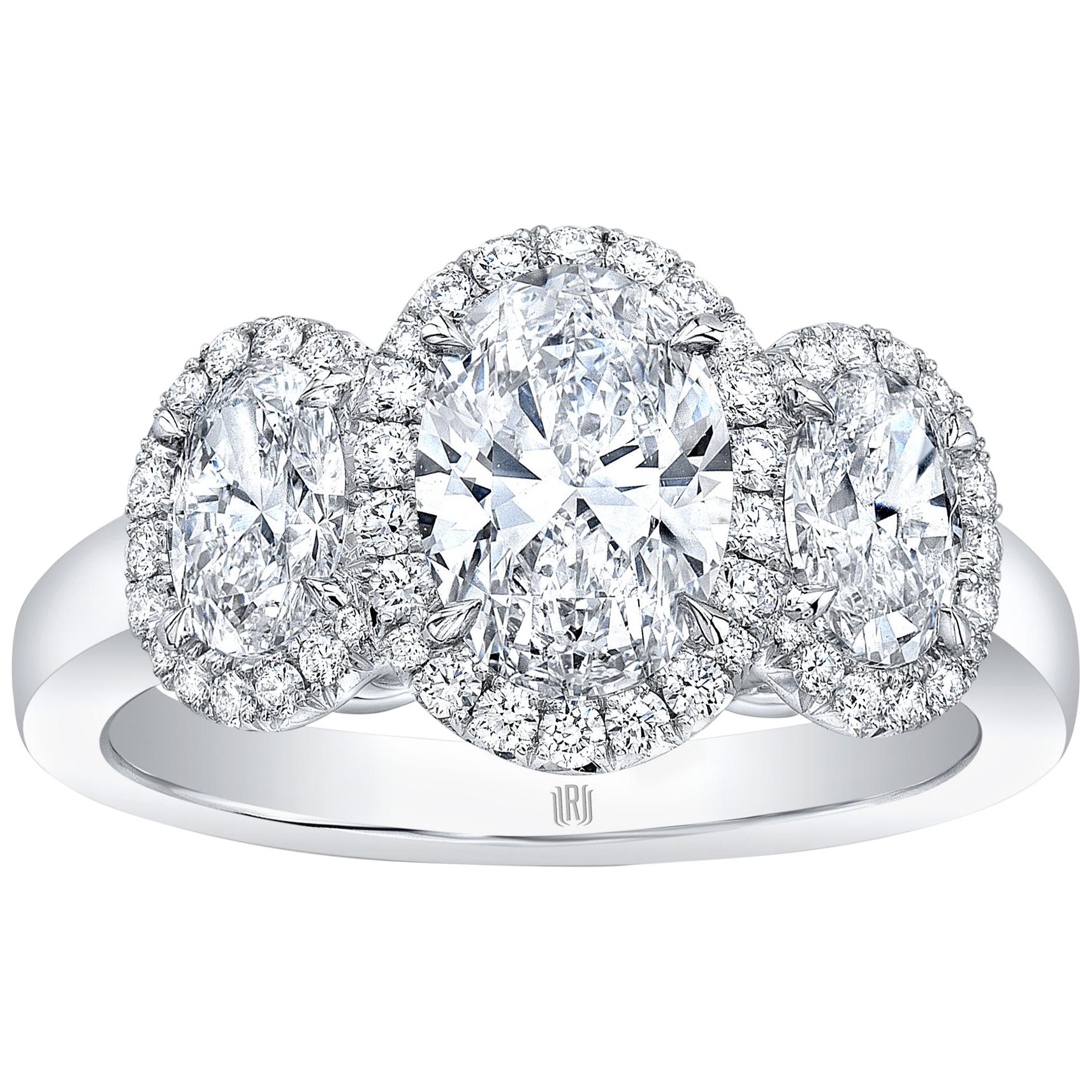 1.84 Carat Total Weight 3-Stone Oval Diamond Halo Ring For Sale