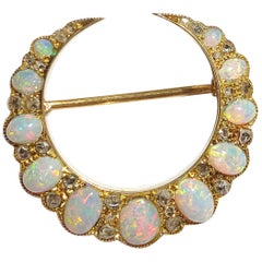 Art Nouveau Early 20th Century 15 Carat Opal Diamond Crescent Brooch