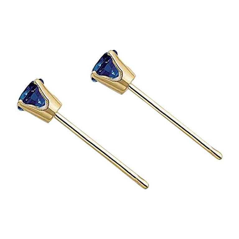 Pair of Tiny Blue Sapphire Studs by Allison Bryan