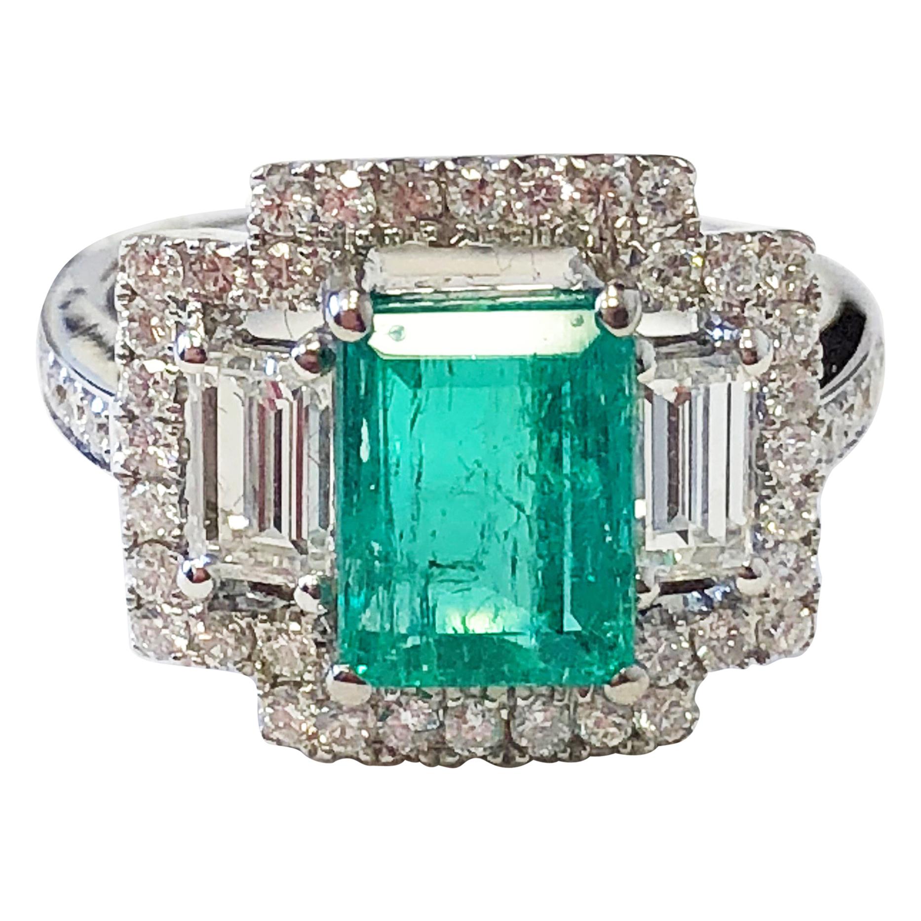 Emerald and White Diamond Ring in 18 Karat White Gold
