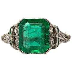 Enticing Platinum Diamonds and GIA Certified Emerald Ring