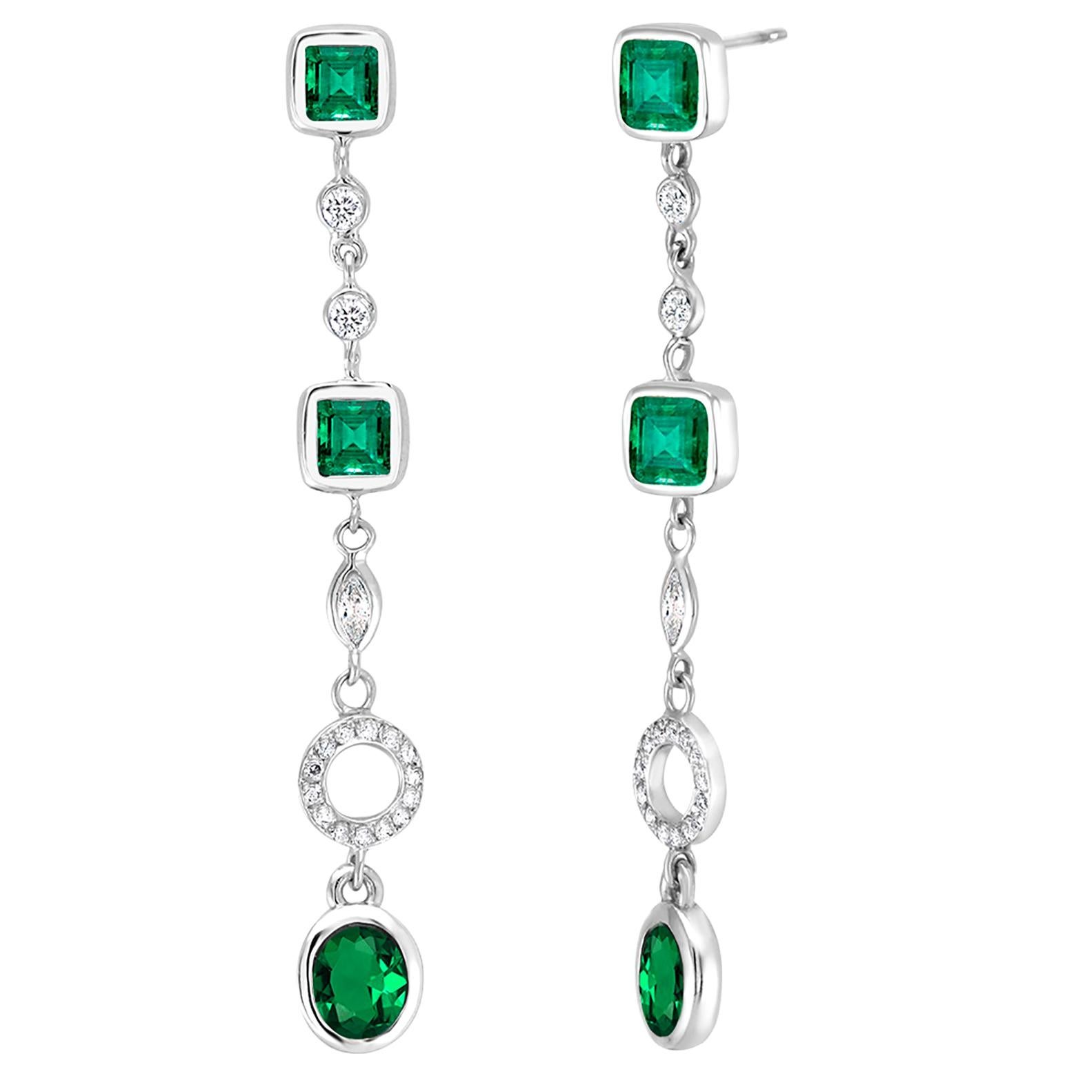 Emerald and Diamond Drop Gold Earrings Two Inch Long Weighing 3.90 Carat 