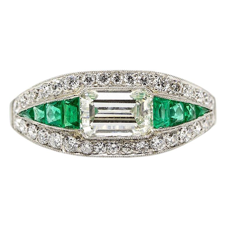 Estate Platinum Art Deco Old Mine Cut Diamond and Emerald Cut Ring with Emeralds