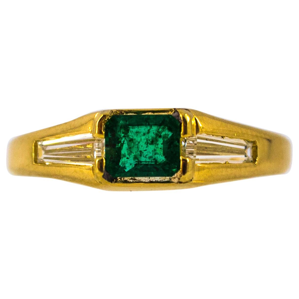 Art Deco 0.55 Carat Emerald 0.70 Carat White Baguette Diamond Yellow Gold Ring