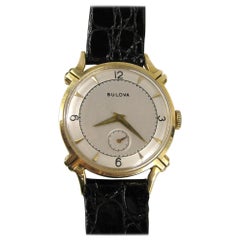 Bulova Montre-bracelet pour homme en or jaune 14 carats, années 1950