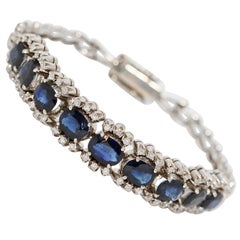 Vintage 18 Karat White Gold Tennis Bracelet with Natural Blue Sapphires and Diamonds