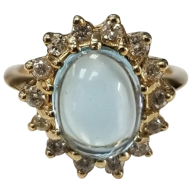 Blue Topaz Cabochon and Diamond Ring