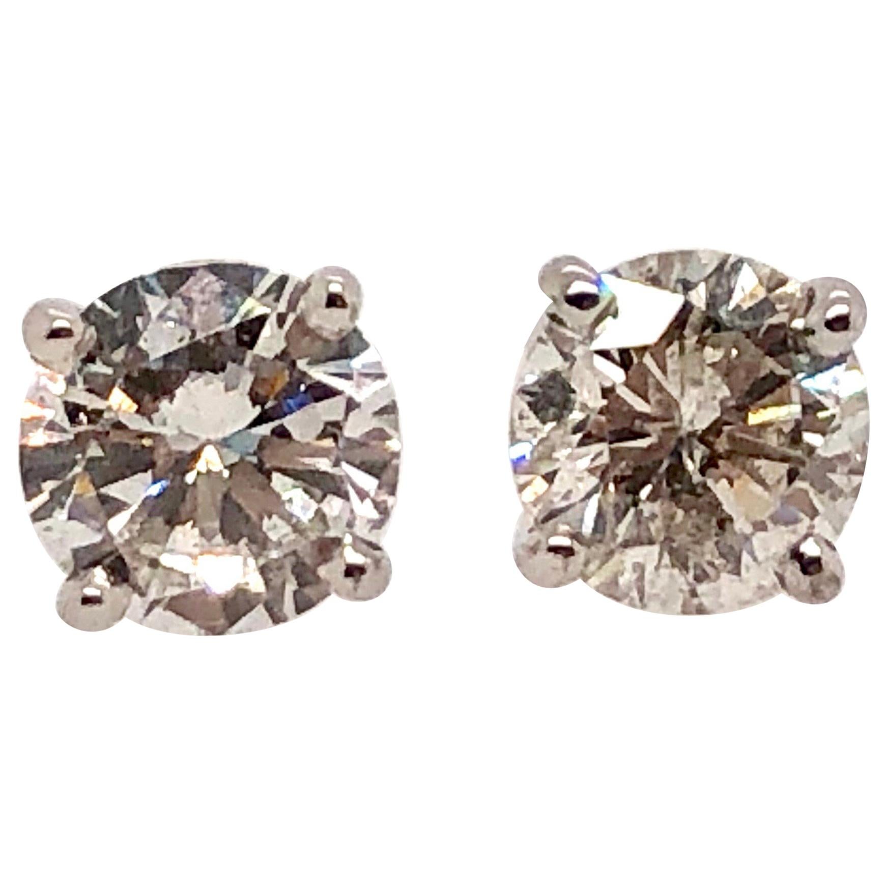 0.84 Carat Round Cut Diamond and White Gold Diamond Stud Earrings