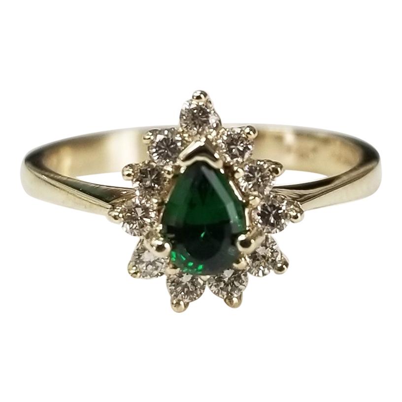Ring aus 14 Karat Gelbgold mit grünem Turmalin und Diamant im Angebot