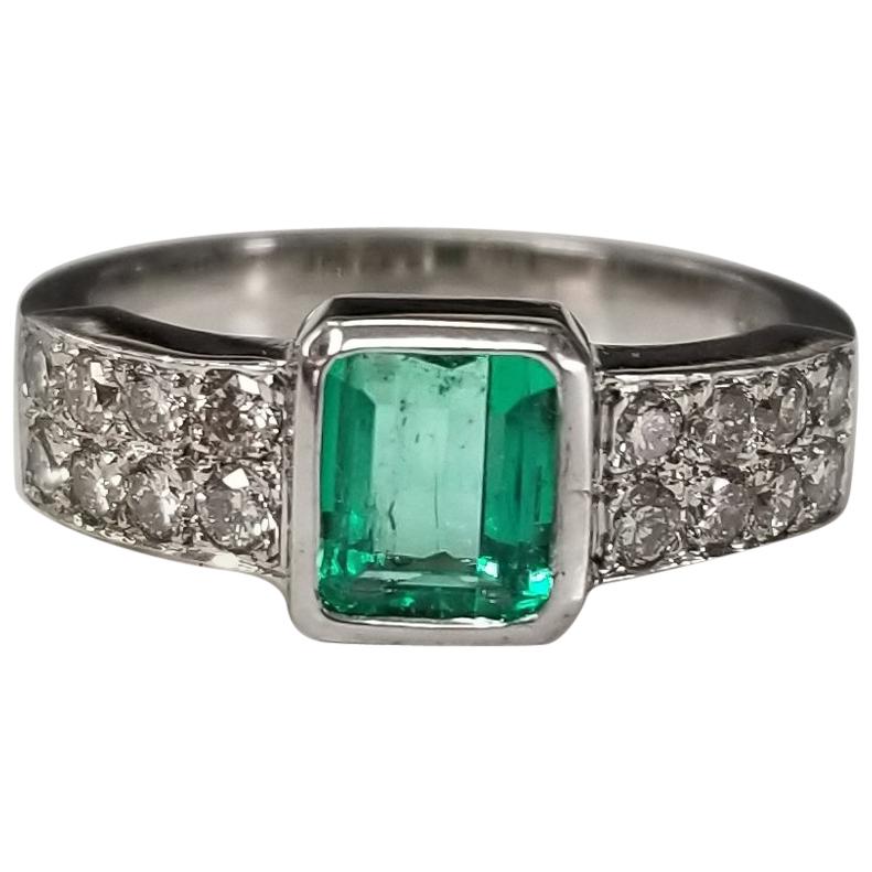 14 Karat White Gold Emerald Cut Emerald and Diamond Ring For Sale