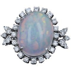 White Gold 13.57 Carat Crystal Opal with 1.12 Carat Diamond Ring