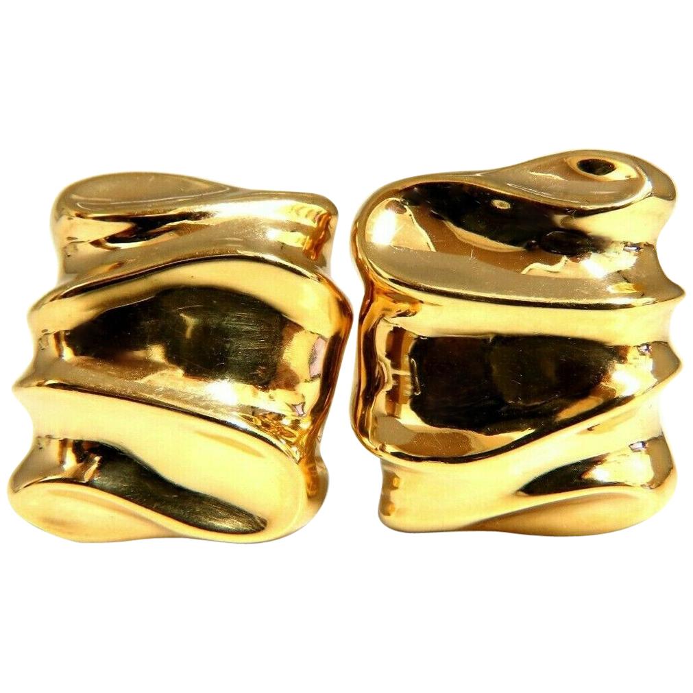 14 Karat Gold Wave Textured Clip Earrings and Omega