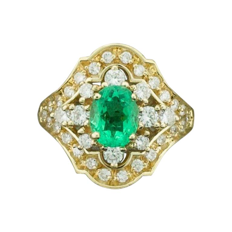 Fetching Emerald and Diamond Ring in Yellow Gold Emerald 1.35, Diamonds .90 For Sale