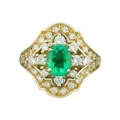 Ring mit fließendem Smaragd und Diamanten aus Gelbgold Smaragd 1,35, Diamanten 0,90