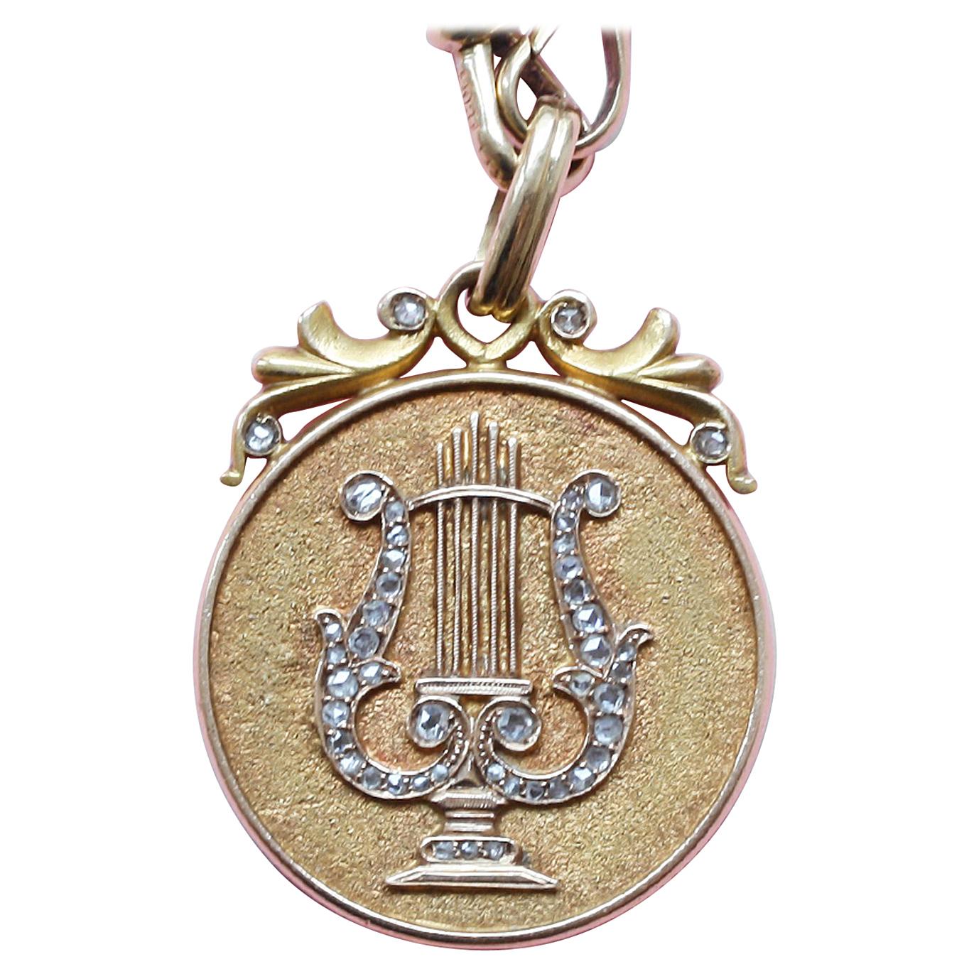 Gold and Diamond Lyre Pendant