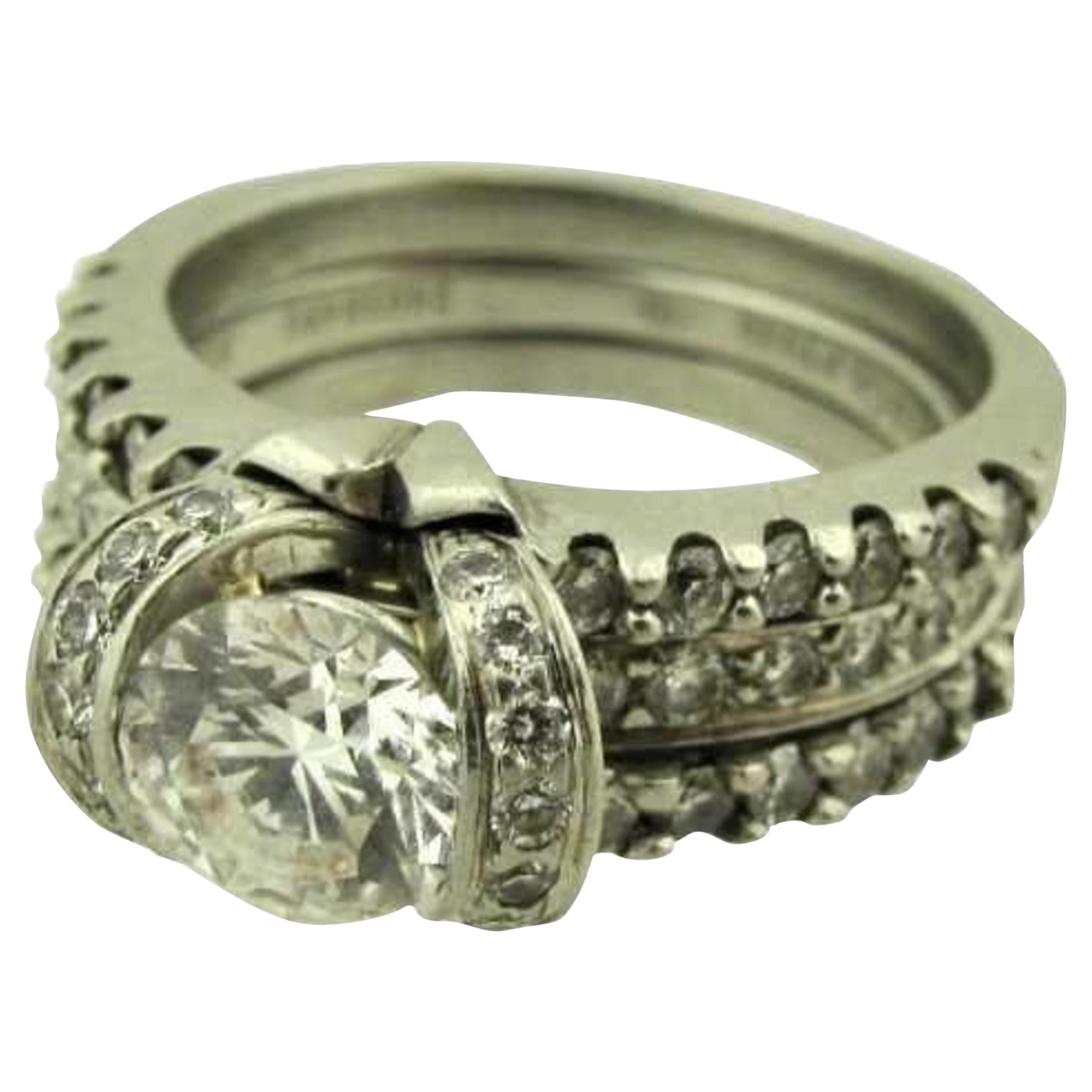 Elegant Platinum and Diamond Bow Ribbon Ring by Tiffany & Co