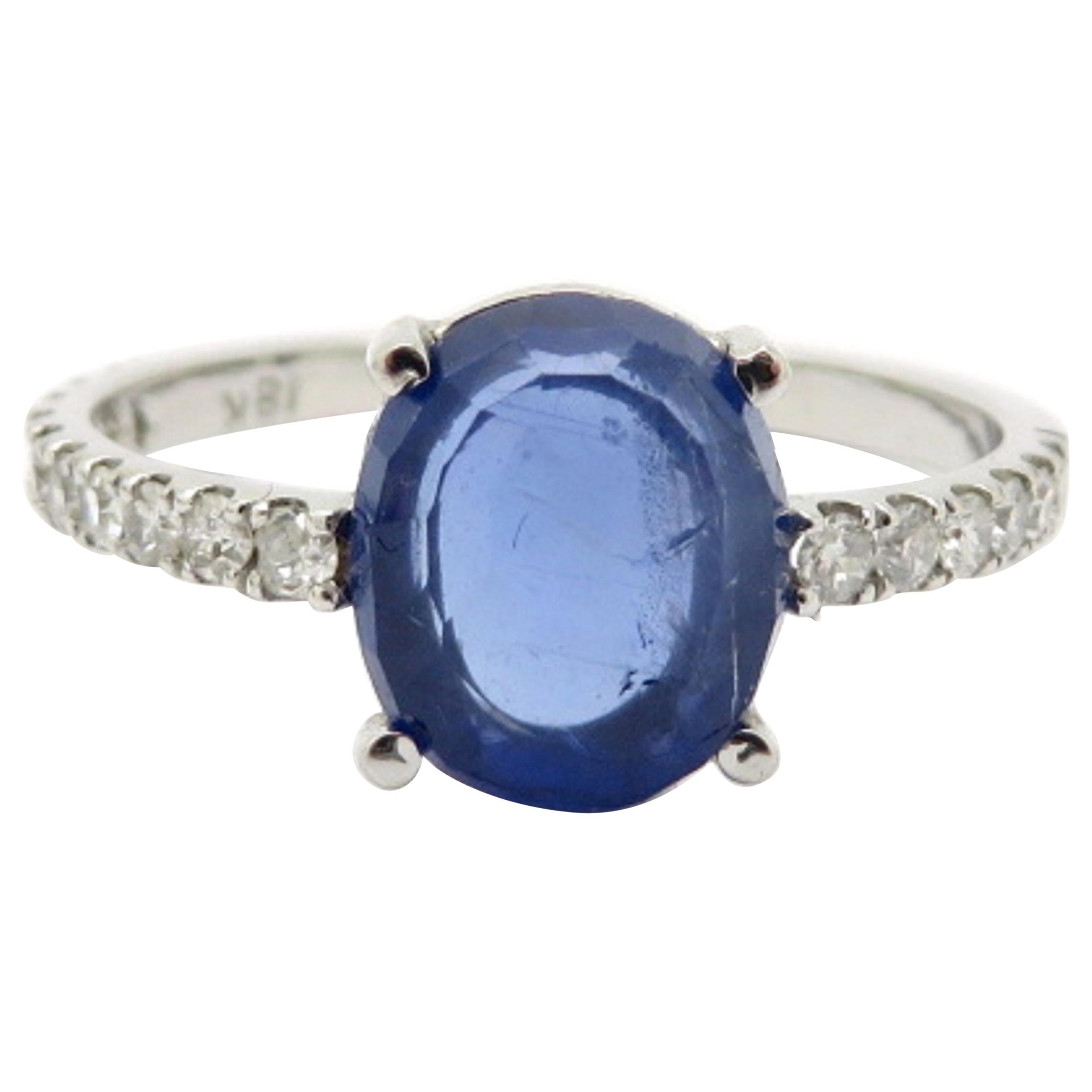 Estate Vintage 18 Karat White Gold Burmese Blue Sapphire and Diamond Ring
