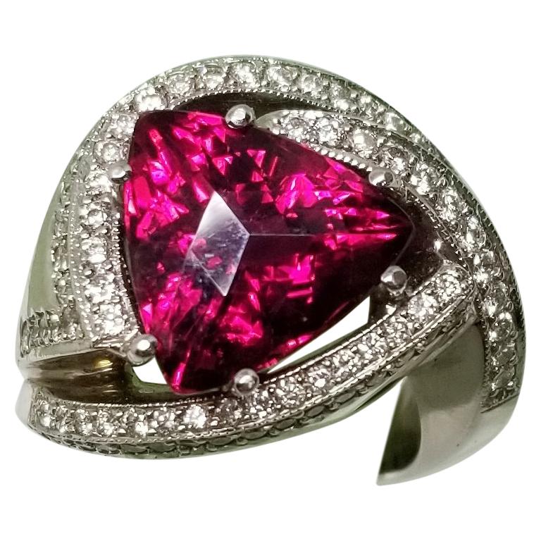 14 Karat "Rubelite" Tourmaline and Swirling Contemporary Diamond Ring