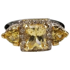 Vintage 14 Karat White Gold Radiant Cut Yellow Sapphire Halo and Diamond Ring