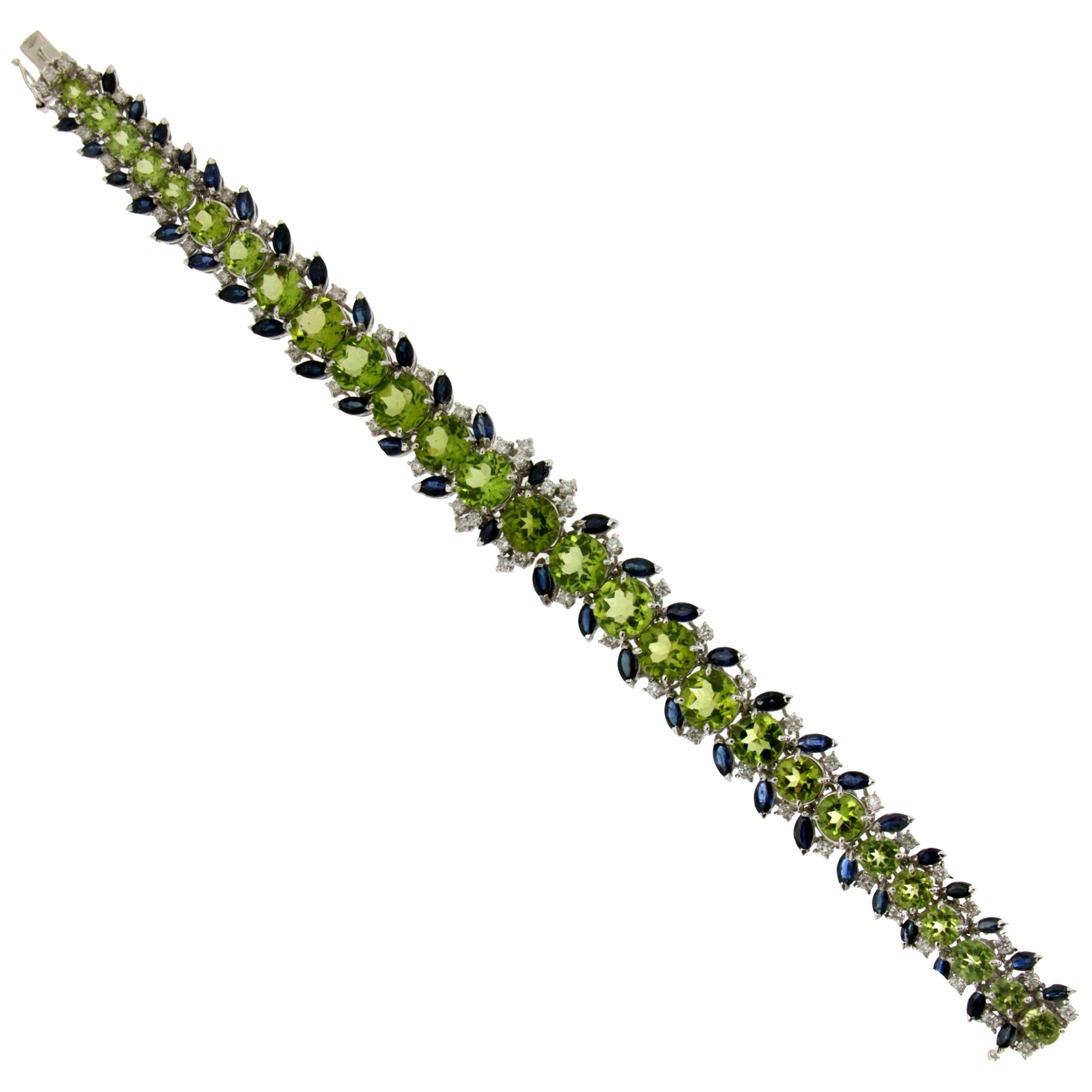 Peridot 18 Karat White Gold Diamonds and Sapphires Cuff Bracelet