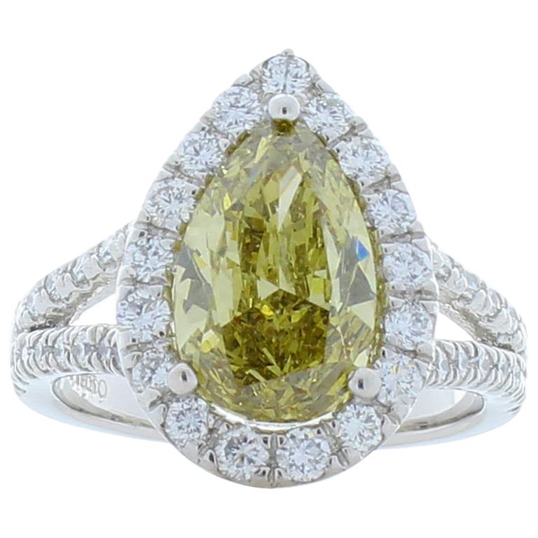 GIA Certified 3.01 Carat Pear Shape Fancy Yellow Diamond Cocktail Ring In Plat