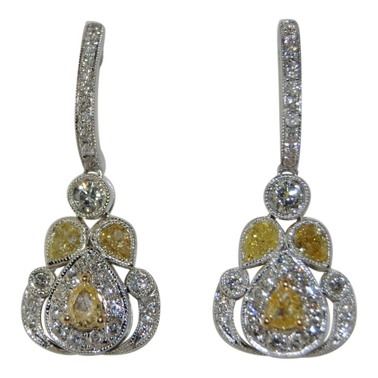1.31 Carat Yellow and White Diamond Earrings in 18 Karat Gold For Sale