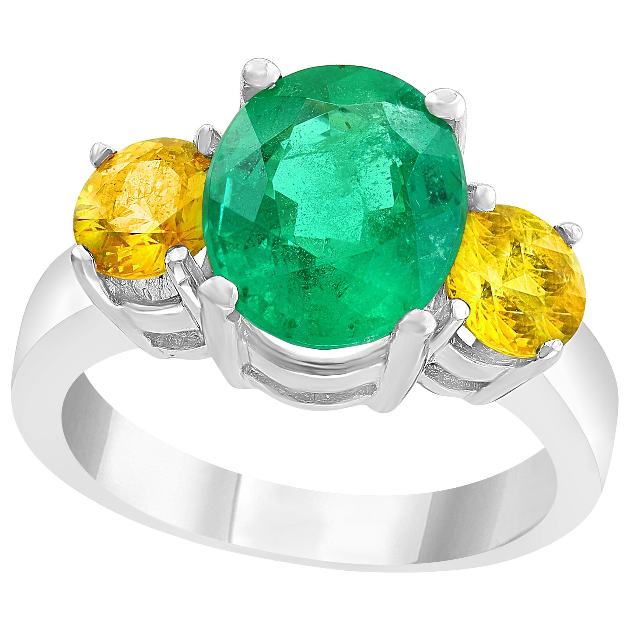 3 Carat Oval Cut Colombian Emerald and Yellow Sapphire 18 Karat Gold Ring For Sale