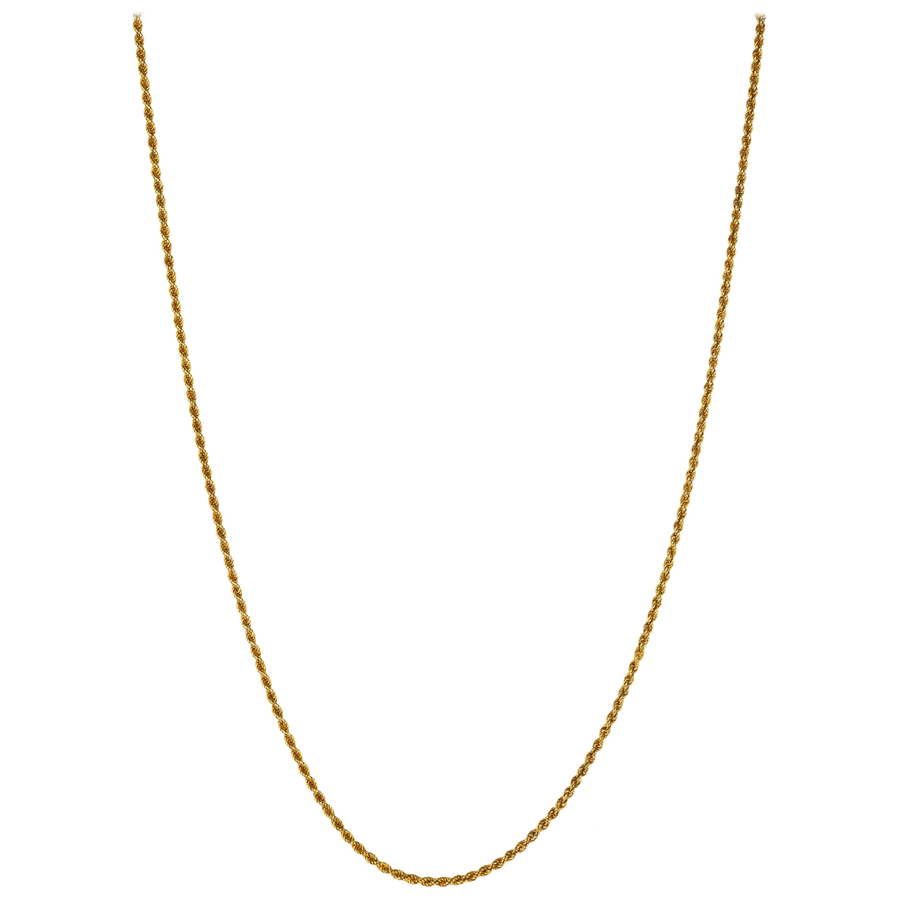 From the Romanov era, period of Tsar Nicholas II, a rare Russian 14k yellow gold rope chain from the ancient capital of Moscow. 

Moscow, 1908-17.

25 in. (63.5 cm) long including clasp.
